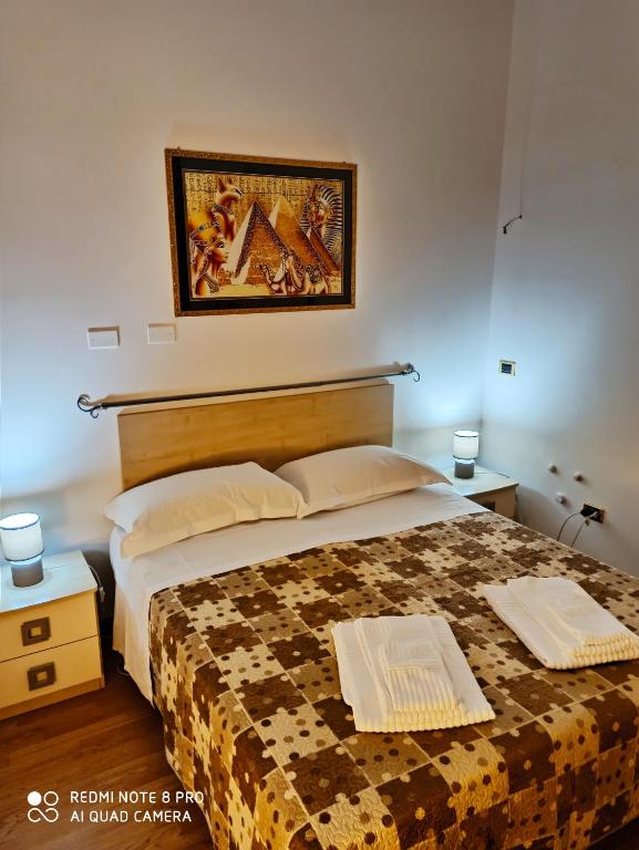 Postel nebo postele na pokoji v ubytování Rooms Center Wolf - Matrimoniale e Comunicanti