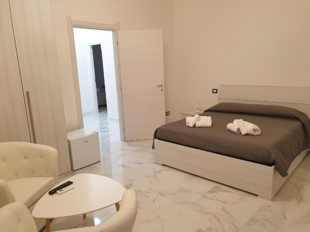 Postel nebo postele na pokoji v ubytování FG Vacanze