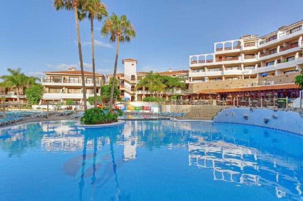 Πισίνα στο ή κοντά στο Nice apartment on the Golf Course by the beach
