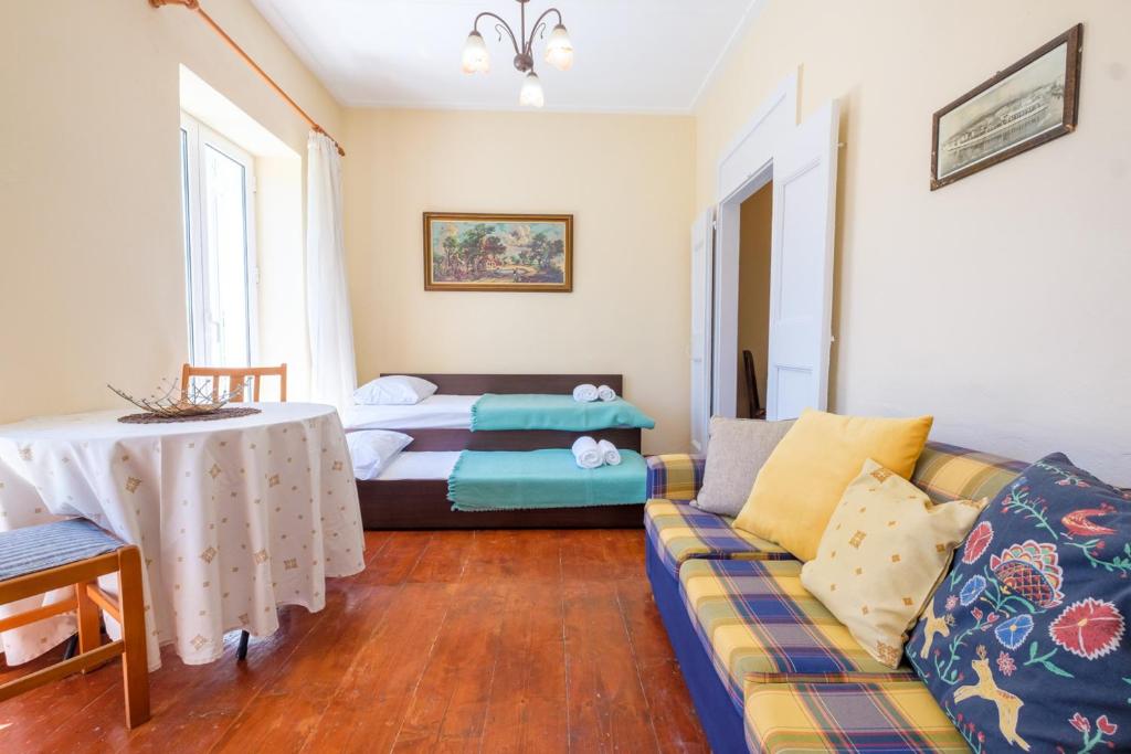 Postel nebo postele na pokoji v ubytování Annetas House