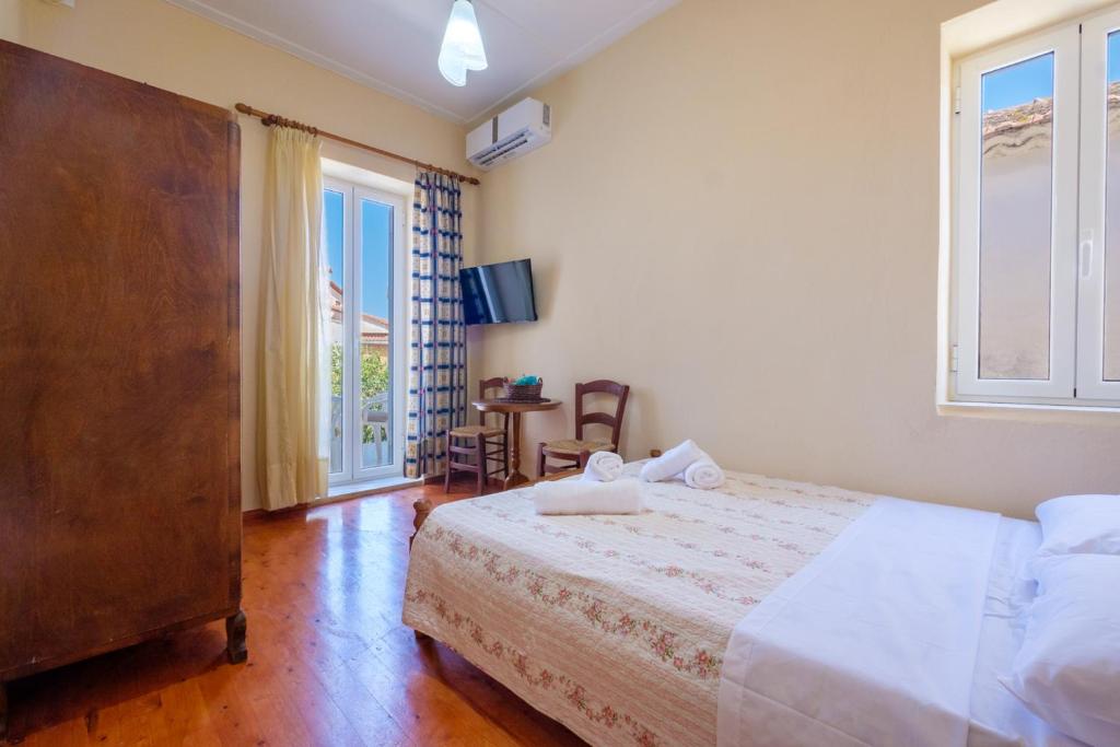 Postel nebo postele na pokoji v ubytování Annetas House