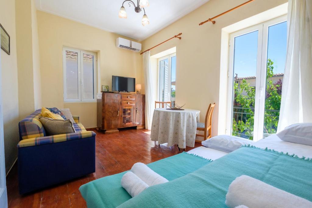 Postel nebo postele na pokoji v ubytování Annetas House