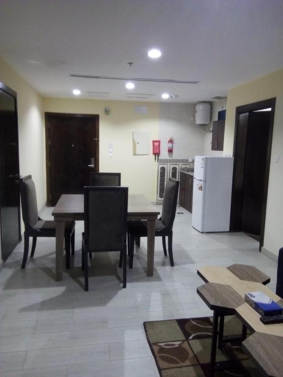 Kuchyň nebo kuchyňský kout v ubytování Shahad Alola Serviced apartments