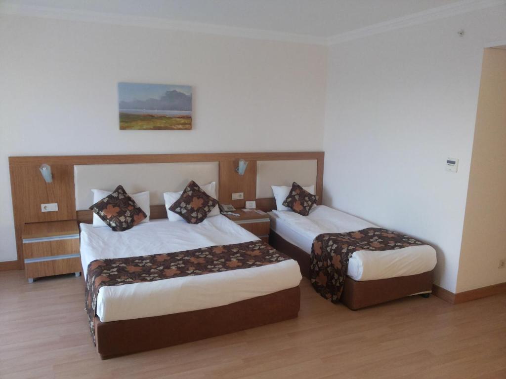Postel nebo postele na pokoji v ubytování Cenger Beach Resort Spa - All Inclusive