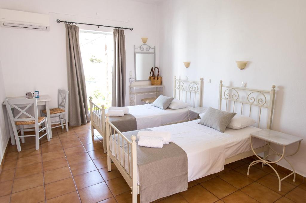 Postel nebo postele na pokoji v ubytování Joanna Apart - Hotel