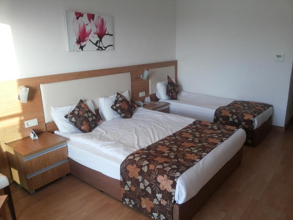 Postel nebo postele na pokoji v ubytování Cenger Beach Resort Spa - All Inclusive