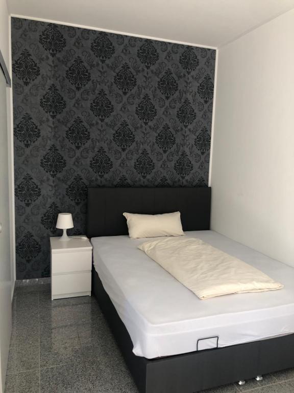 Postel nebo postele na pokoji v ubytování Hotel Restaurant Artemis