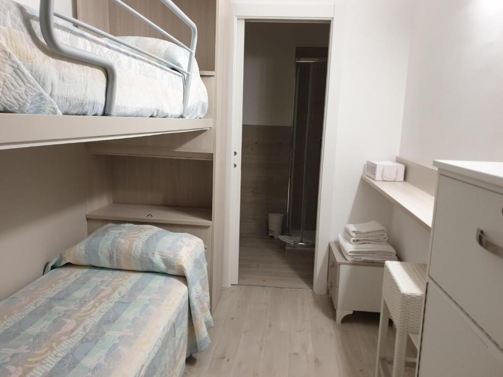 Postel nebo postele na pokoji v ubytování Iris home