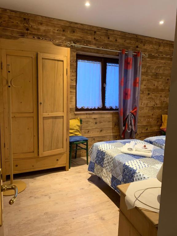 Postel nebo postele na pokoji v ubytování Appartamento Rustico