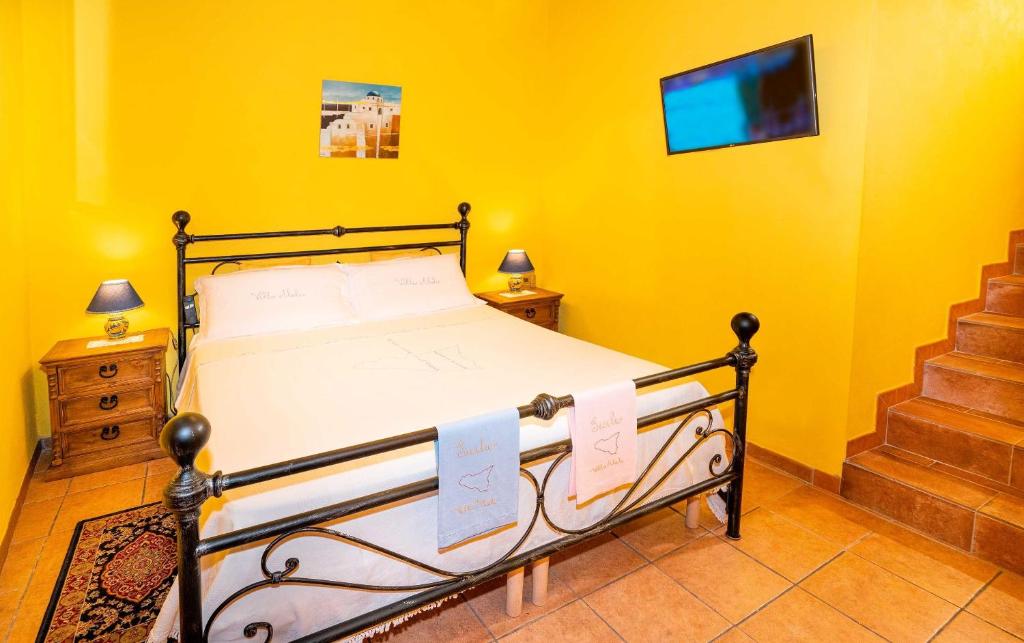 Łóżko lub łóżka w pokoju w obiekcie Villa Alecla - Sea Villa near Taormina