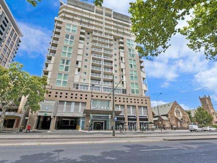 a large building on a city street with a street at RNR North Terrace in Adelaide