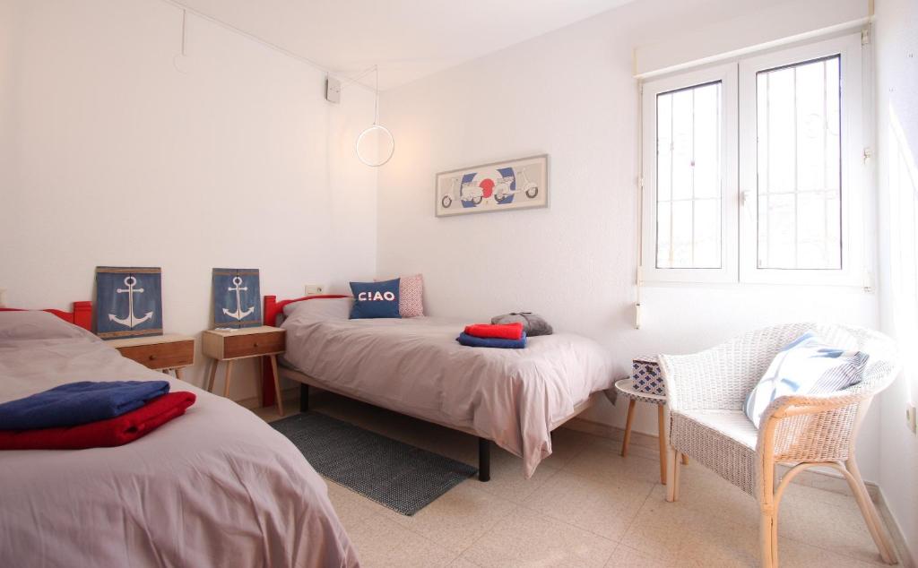 Posteľ alebo postele v izbe v ubytovaní Apartamento Dúplex Aldebaran by costablancarent