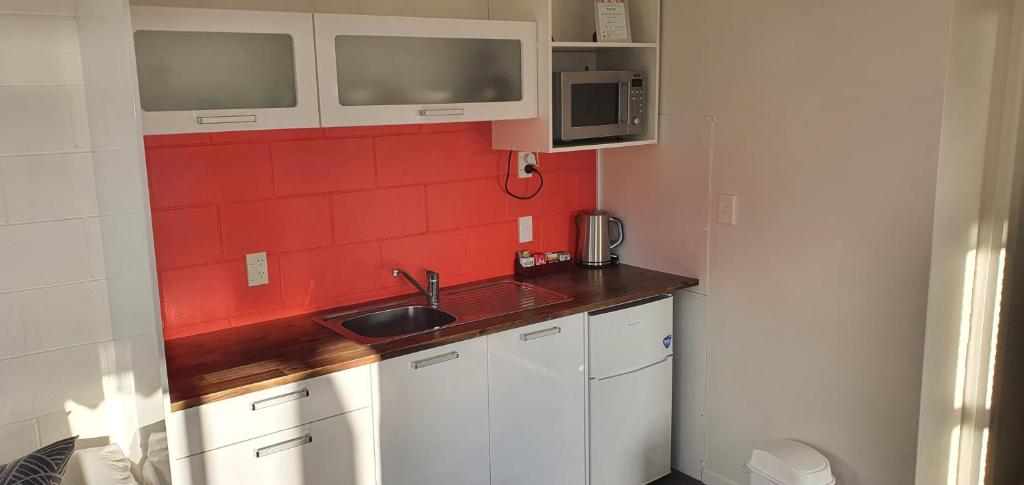 Kuchyň nebo kuchyňský kout v ubytování Accent On Taupo Motor Lodge