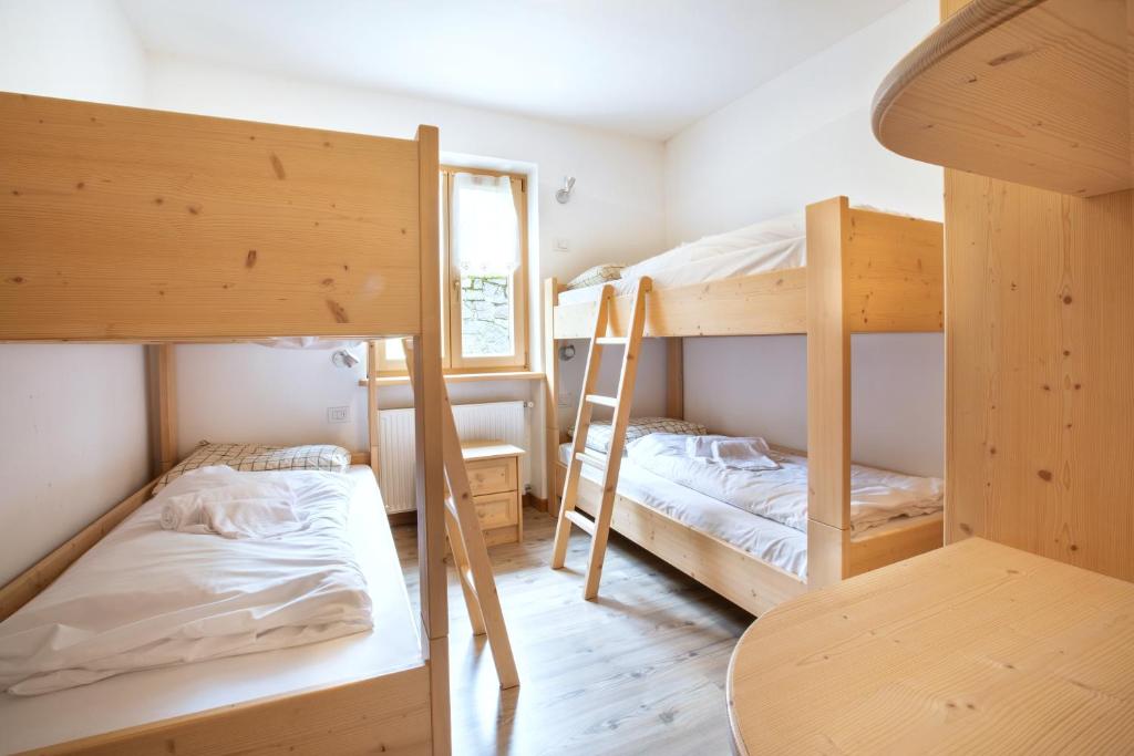 Postel nebo postele na pokoji v ubytování Ciesa Al Drago