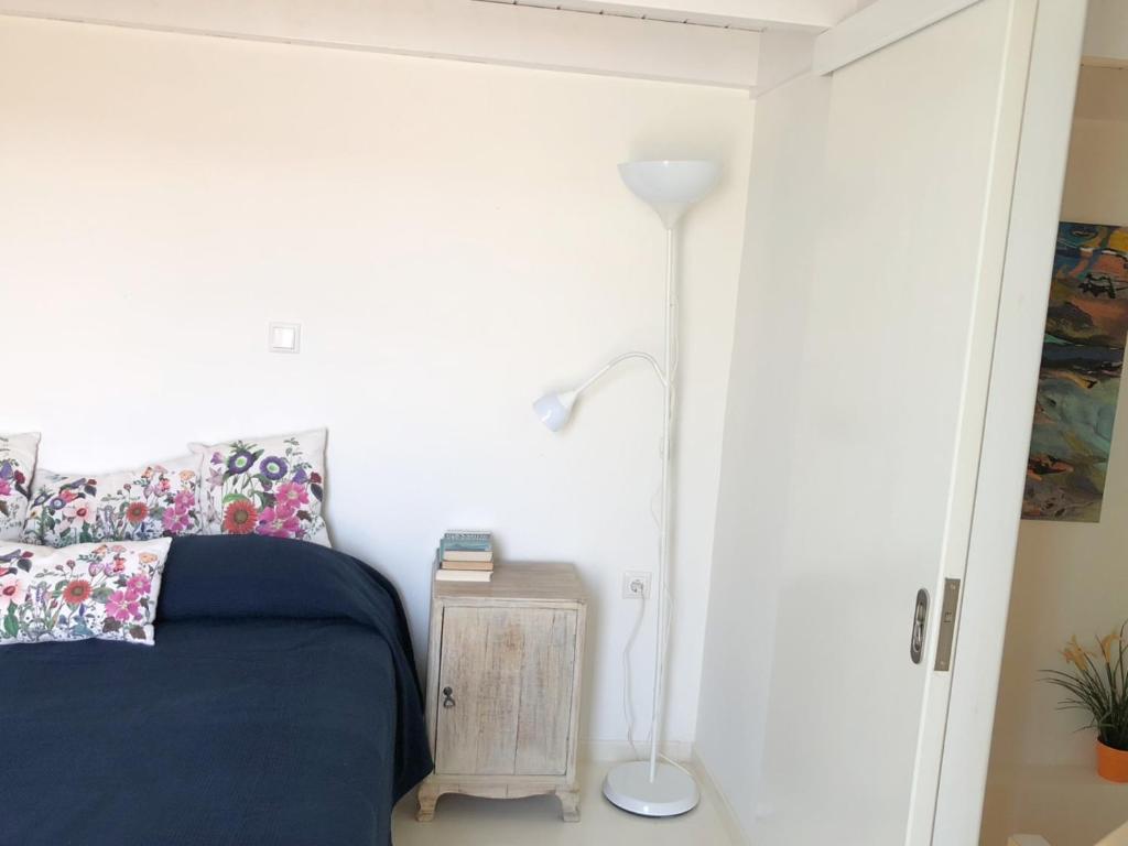 A bed or beds in a room at La Casetta