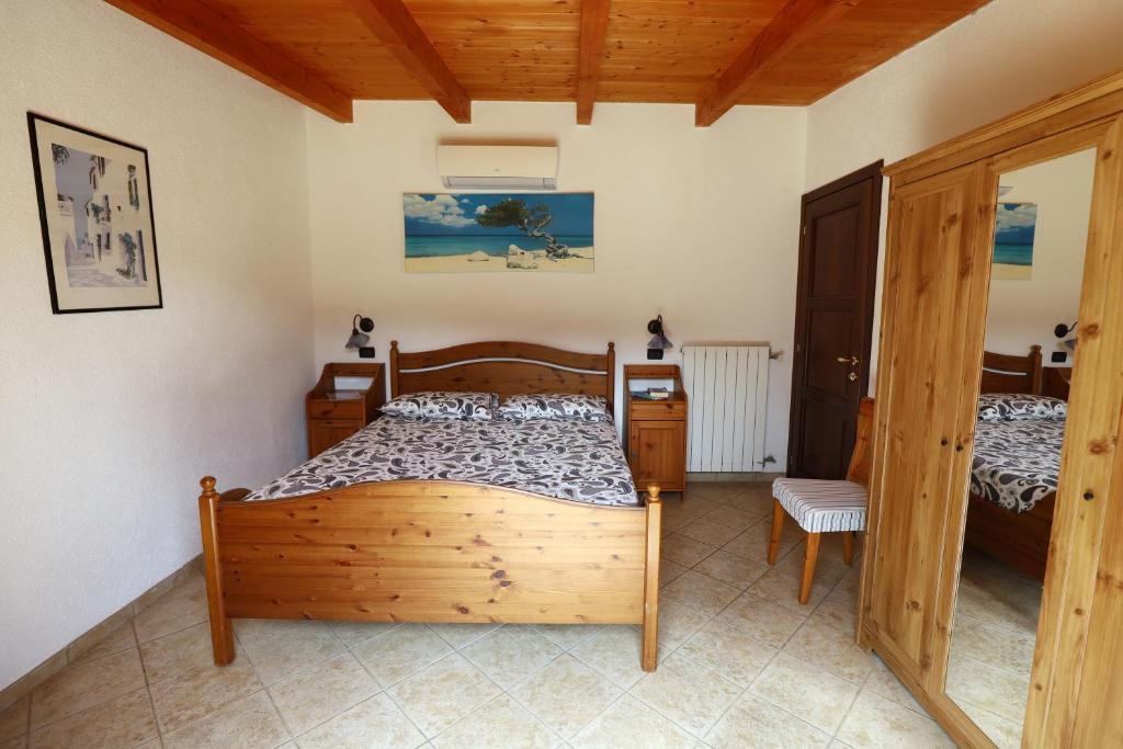 A bed or beds in a room at Totohouse Da Marco piscina riscaldata