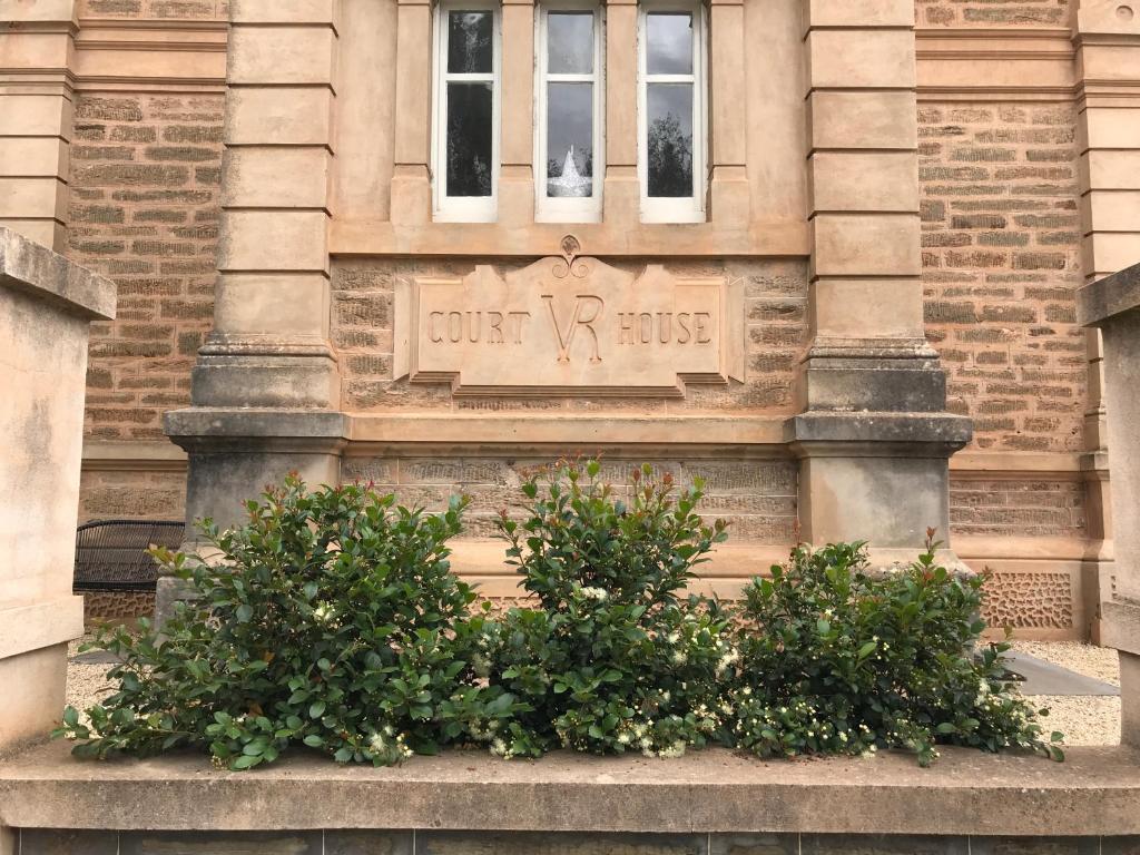 a sign on the side of a building at Gawler Heritage Accommodation in Gawler