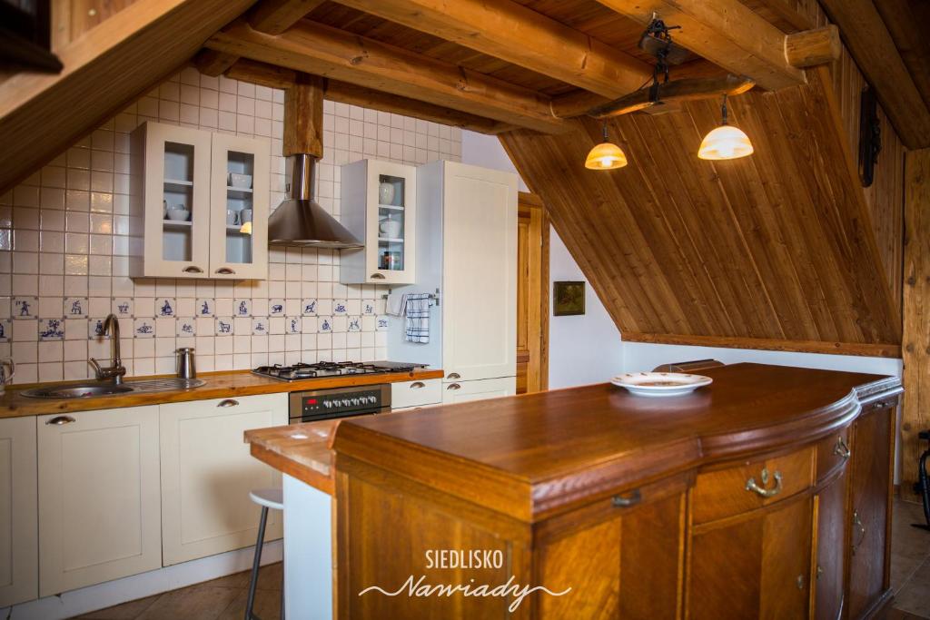 Kuchyň nebo kuchyňský kout v ubytování Siedlisko Nawiady - hotel butikowy