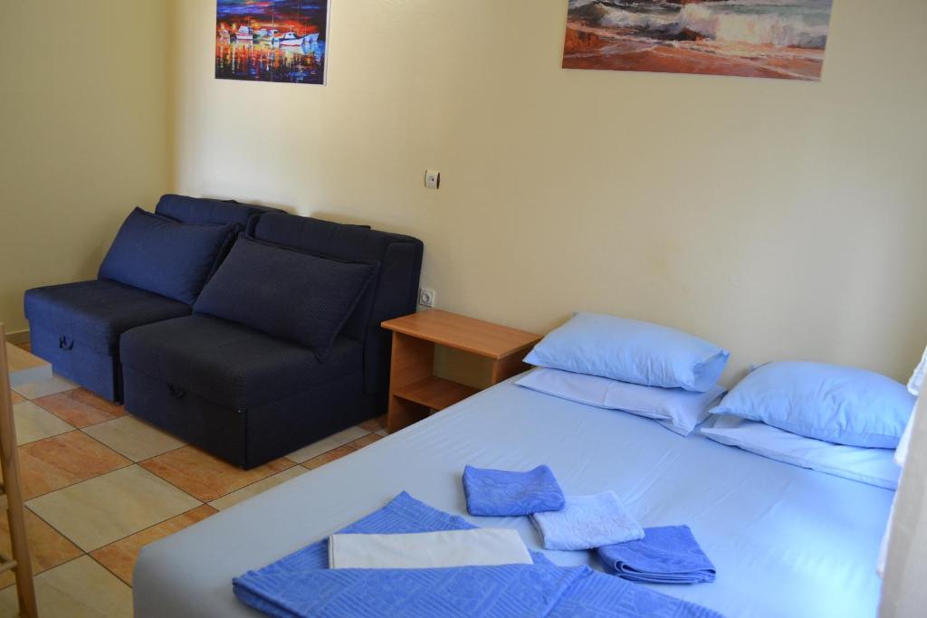 Postel nebo postele na pokoji v ubytování Apartments Milosevic