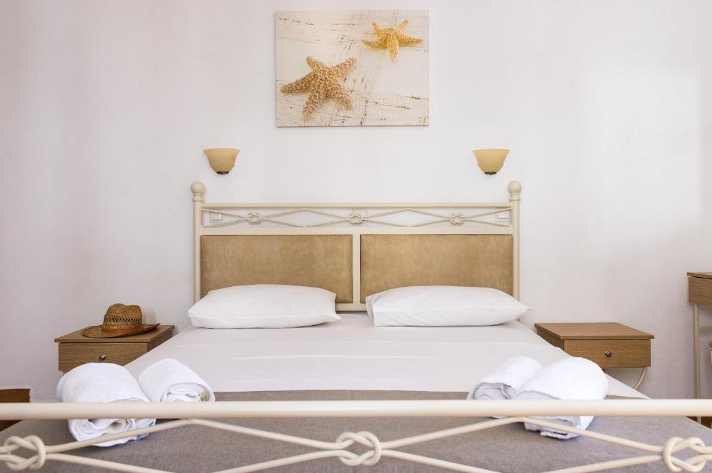 Postel nebo postele na pokoji v ubytování Joanna Apart - Hotel