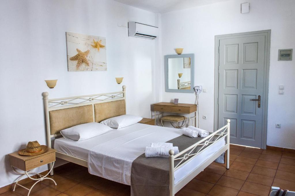 Postel nebo postele na pokoji v ubytování Joanna Apart - Hotel