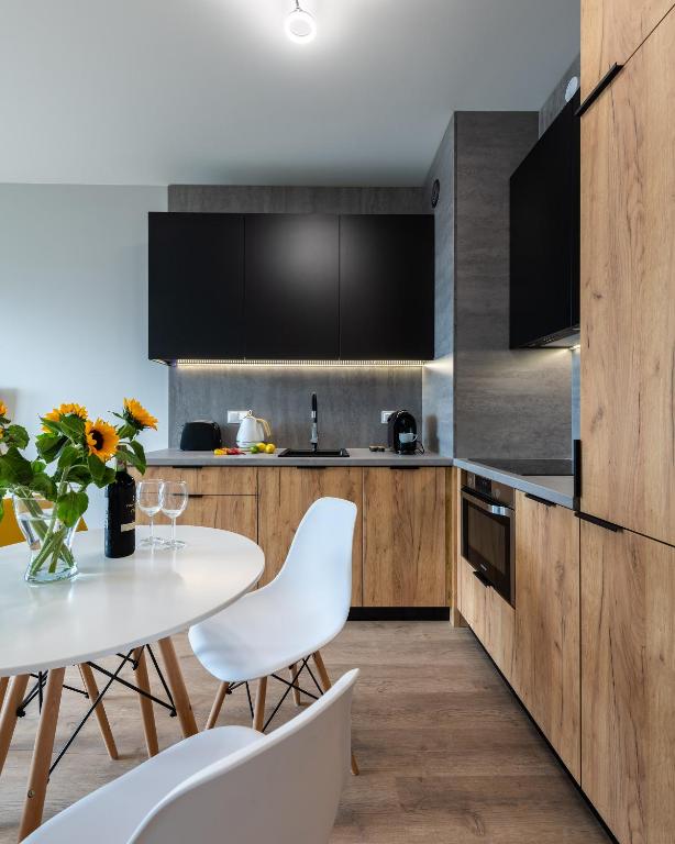 Kuchyňa alebo kuchynka v ubytovaní MODUO Serviced Apartments