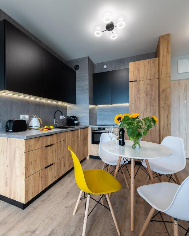 Kuchyňa alebo kuchynka v ubytovaní MODUO Serviced Apartments