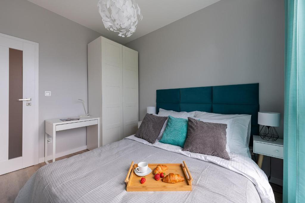Posteľ alebo postele v izbe v ubytovaní MODUO Serviced Apartments