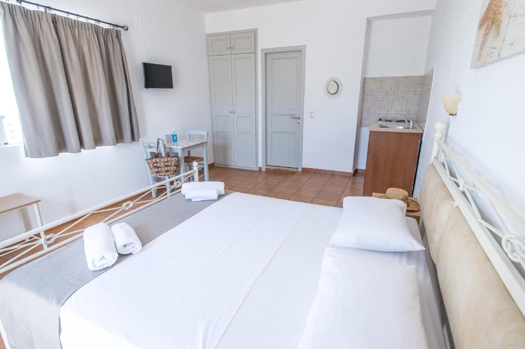 Postel nebo postele na pokoji v ubytování Joanna Apart - Hotel
