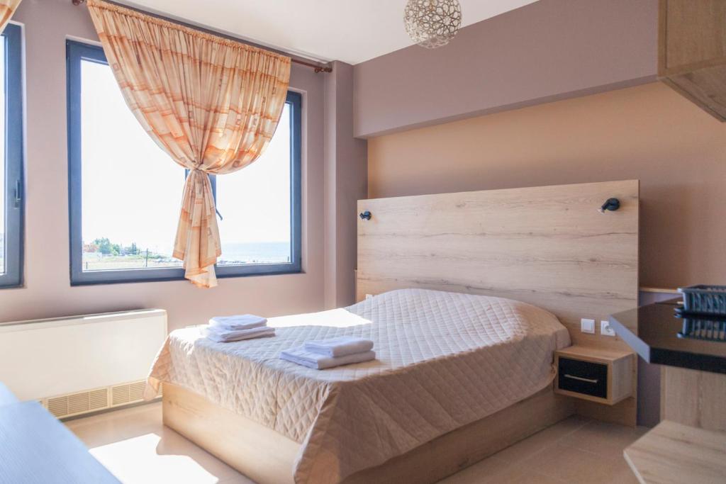 Postel nebo postele na pokoji v ubytování Via Mare Apartments