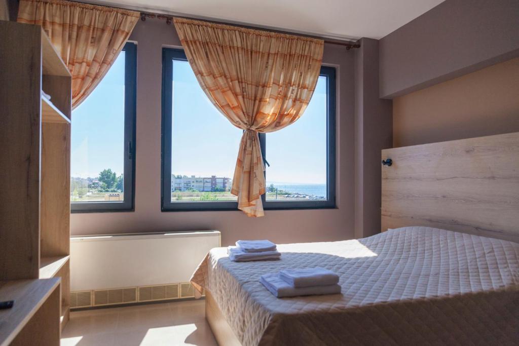 Postel nebo postele na pokoji v ubytování Via Mare Apartments