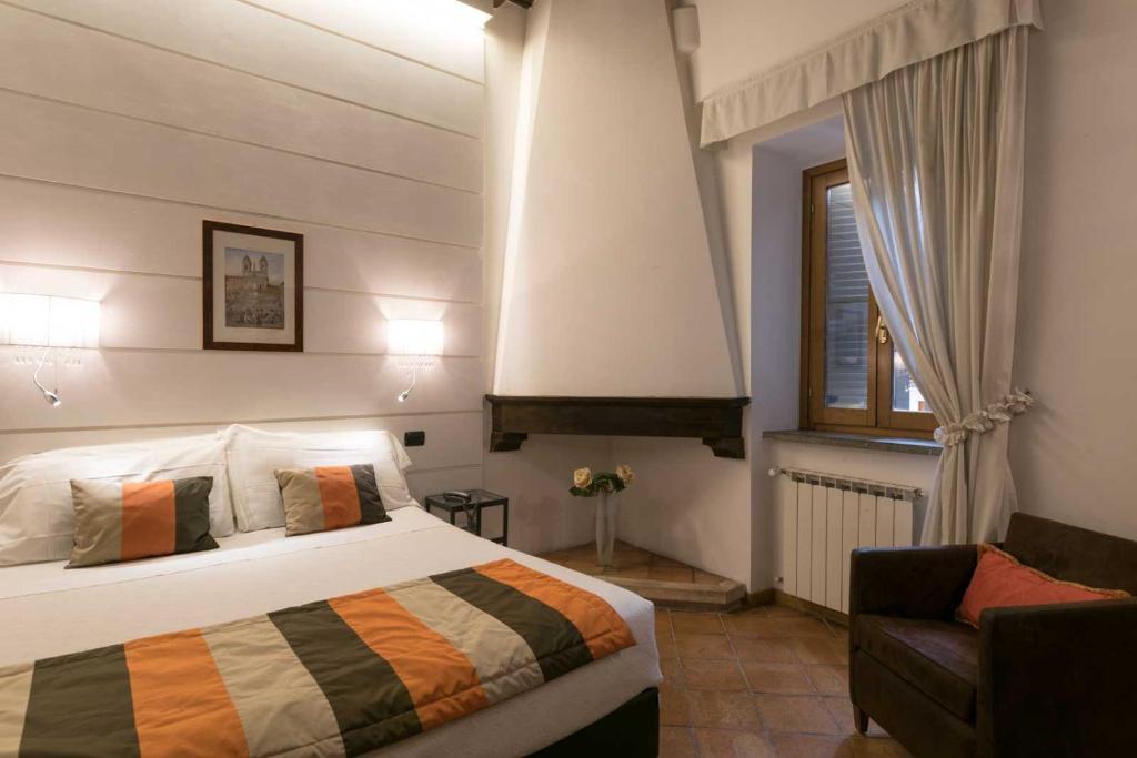 Postel nebo postele na pokoji v ubytování Duca d'Alba Hotel - Chateaux & Hotels Collection