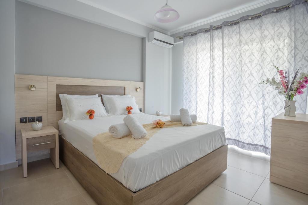 Posteľ alebo postele v izbe v ubytovaní Michaelangelo Apartments
