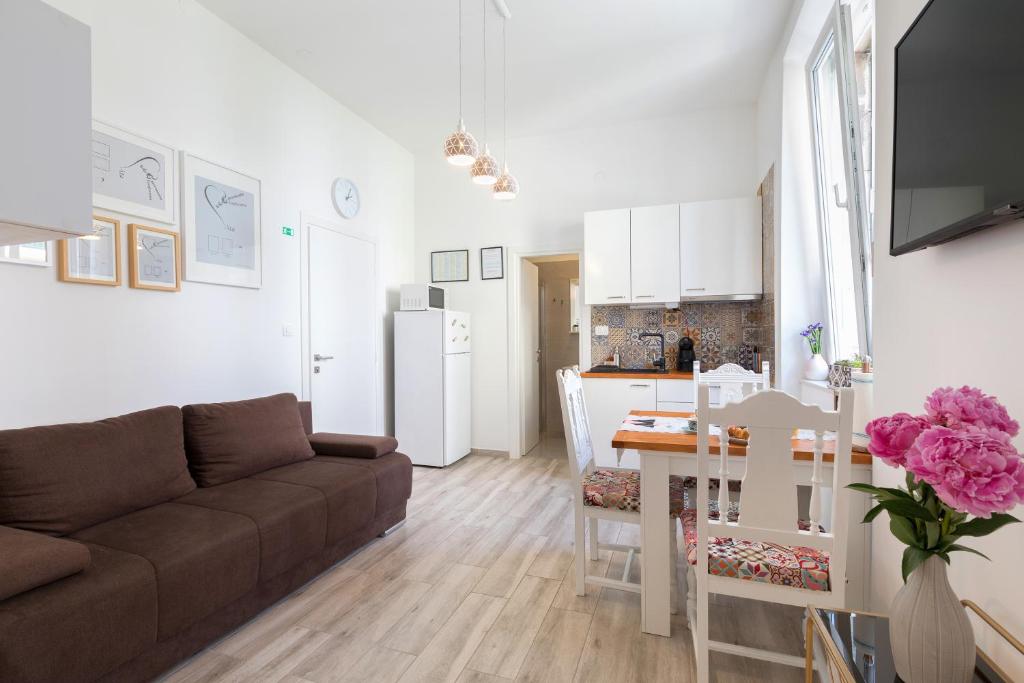 Kuchyňa alebo kuchynka v ubytovaní Apartments Caleta