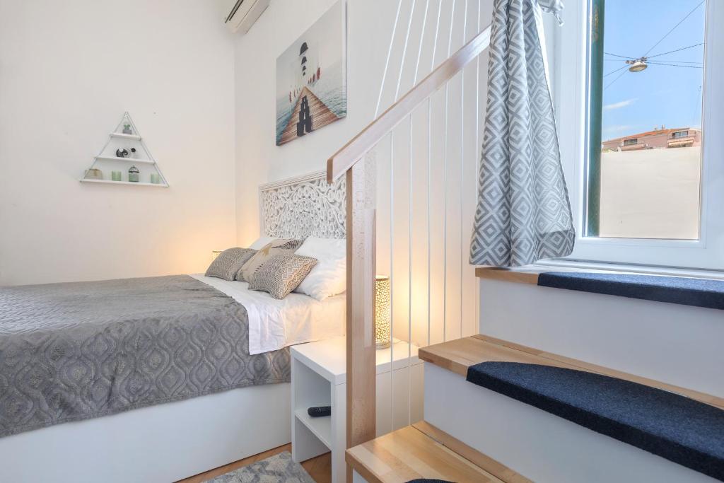 Posteľ alebo postele v izbe v ubytovaní Apartments Caleta
