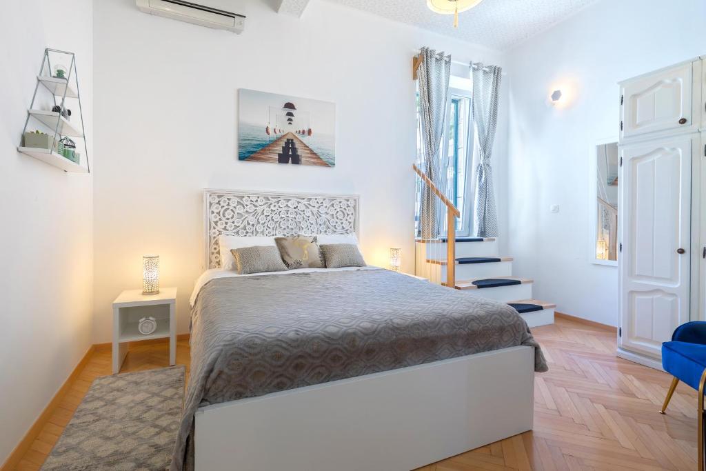 Posteľ alebo postele v izbe v ubytovaní Apartments Caleta