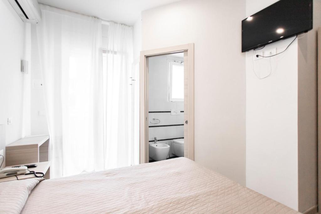 TV a/nebo společenská místnost v ubytování Hotel Primiana