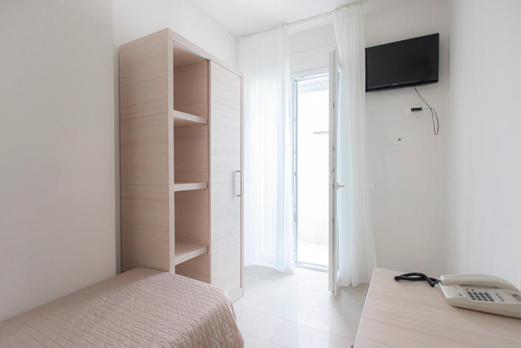 TV a/nebo společenská místnost v ubytování Hotel Primiana