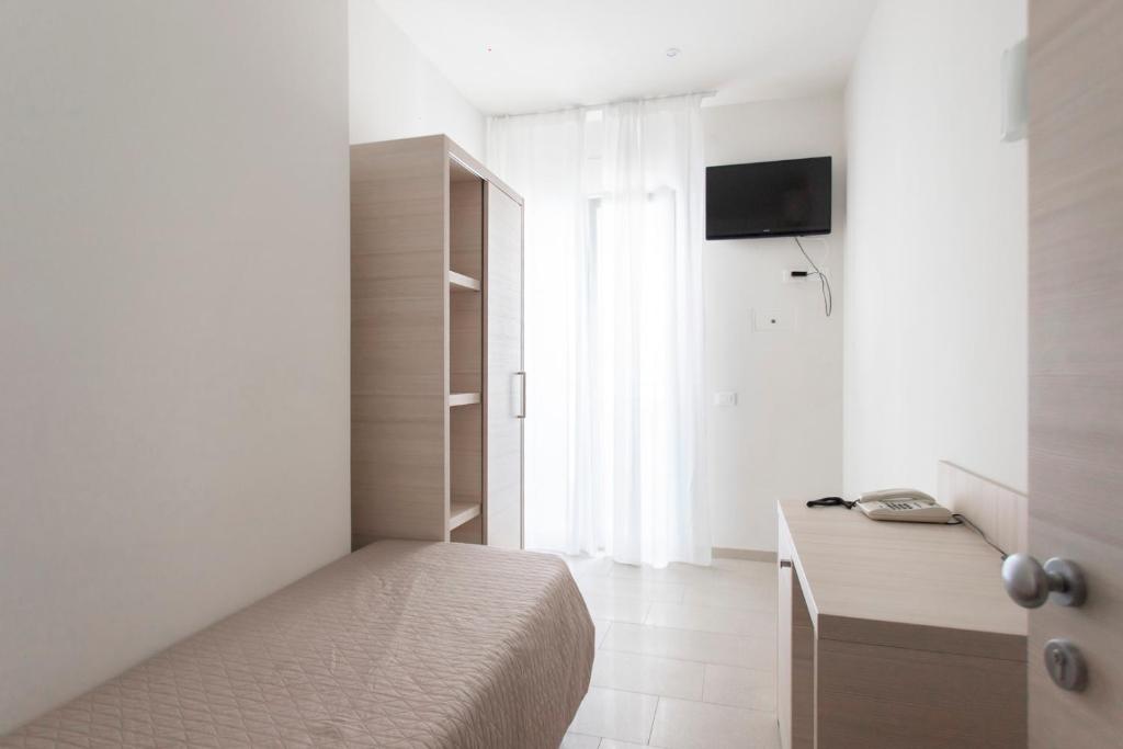 TV a/nebo společenská místnost v ubytování Hotel Primiana