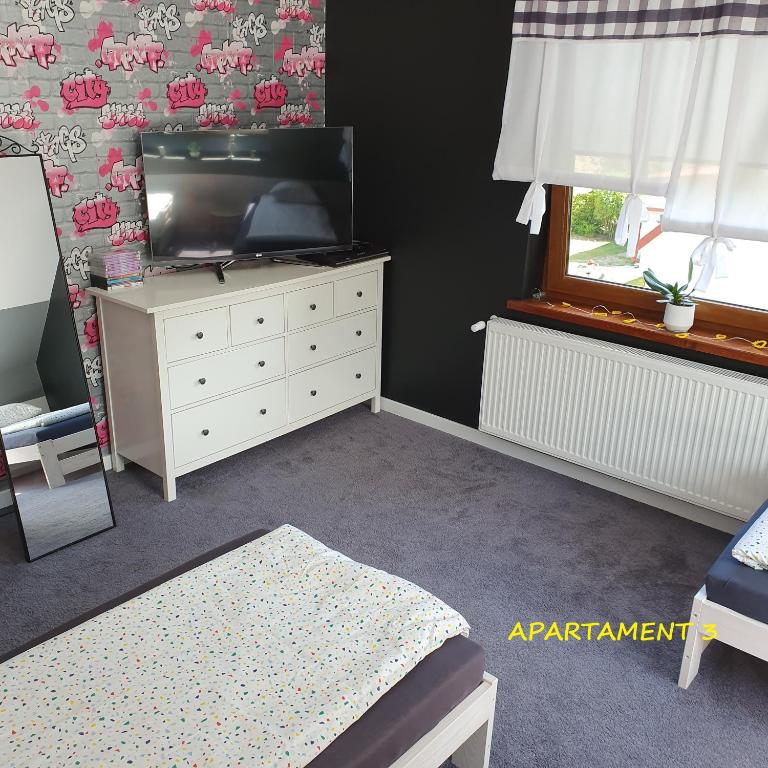 Telewizja i/lub zestaw kina domowego w obiekcie Apartamenty Amalia