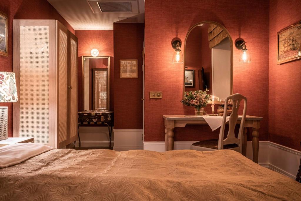 Postel nebo postele na pokoji v ubytování Victory Hotel