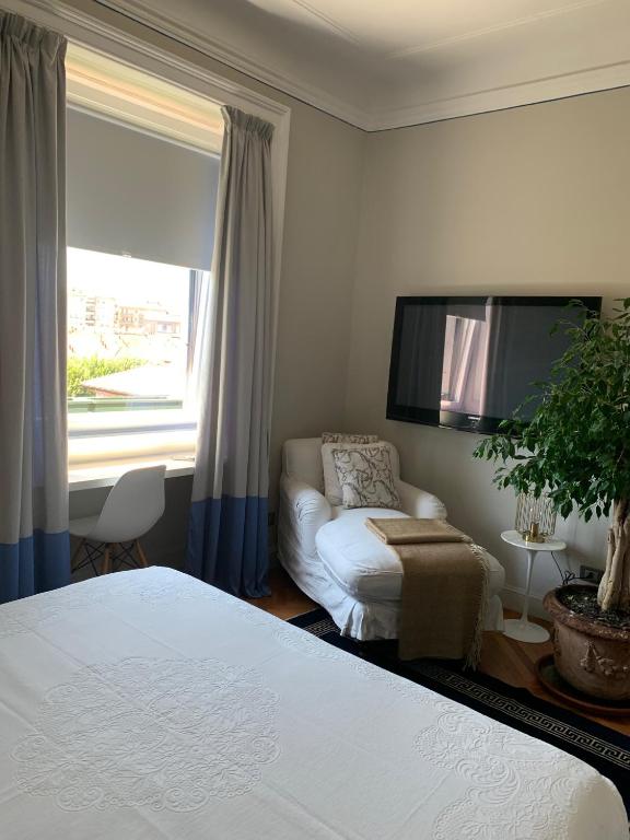 Łóżko lub łóżka w pokoju w obiekcie Pattini Guest House