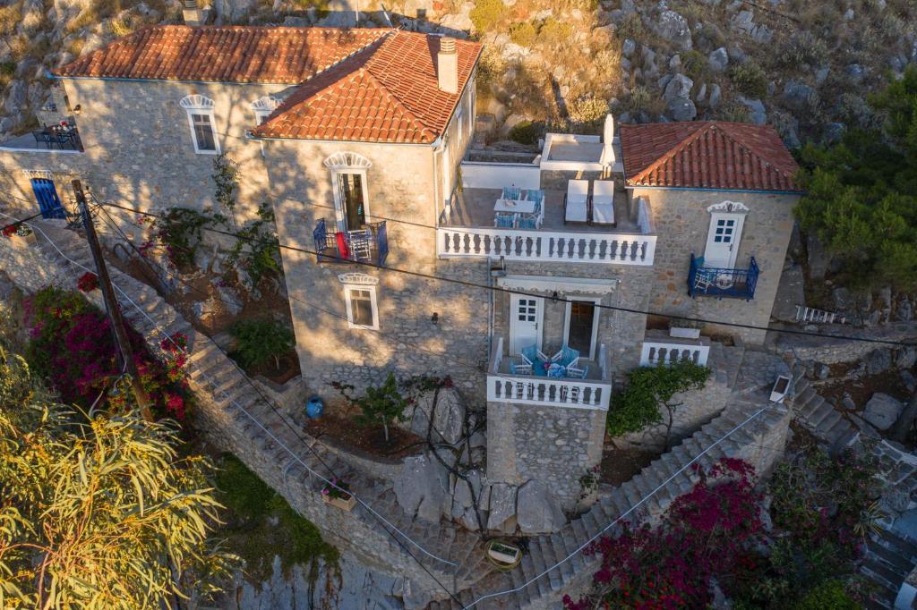 an aerial view of a house with a fence at Villa Mandraki in Hydra