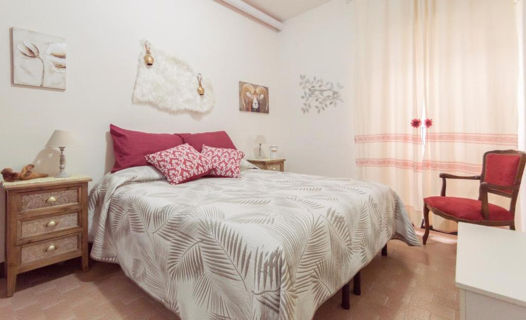 Łóżko lub łóżka w pokoju w obiekcie Tesori di Sardegna