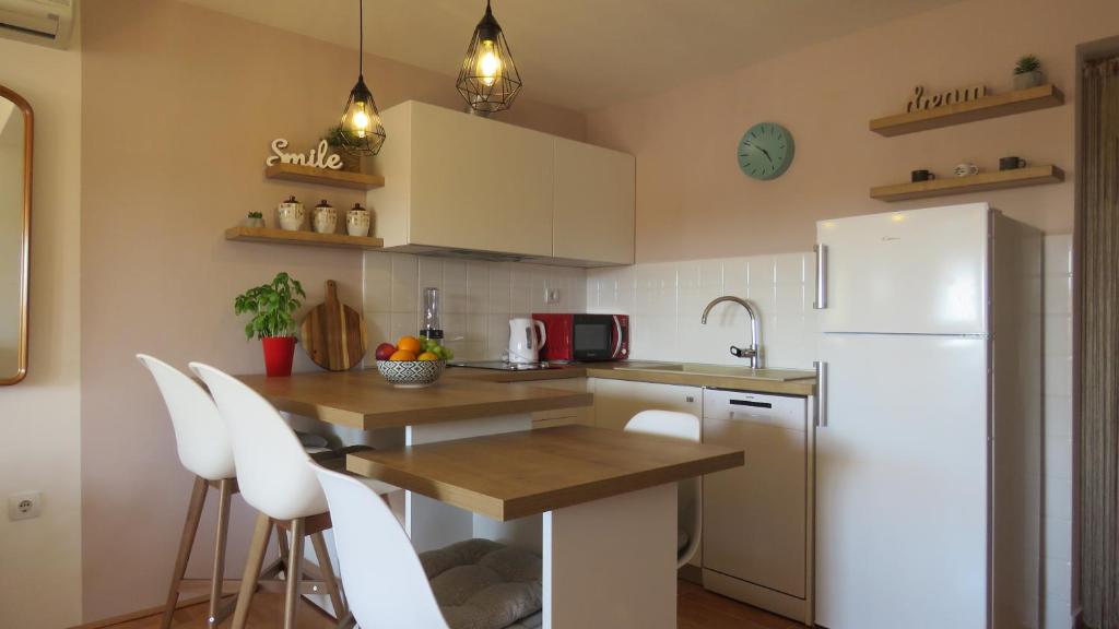 Kuchyň nebo kuchyňský kout v ubytování Outdoor apartment Lina