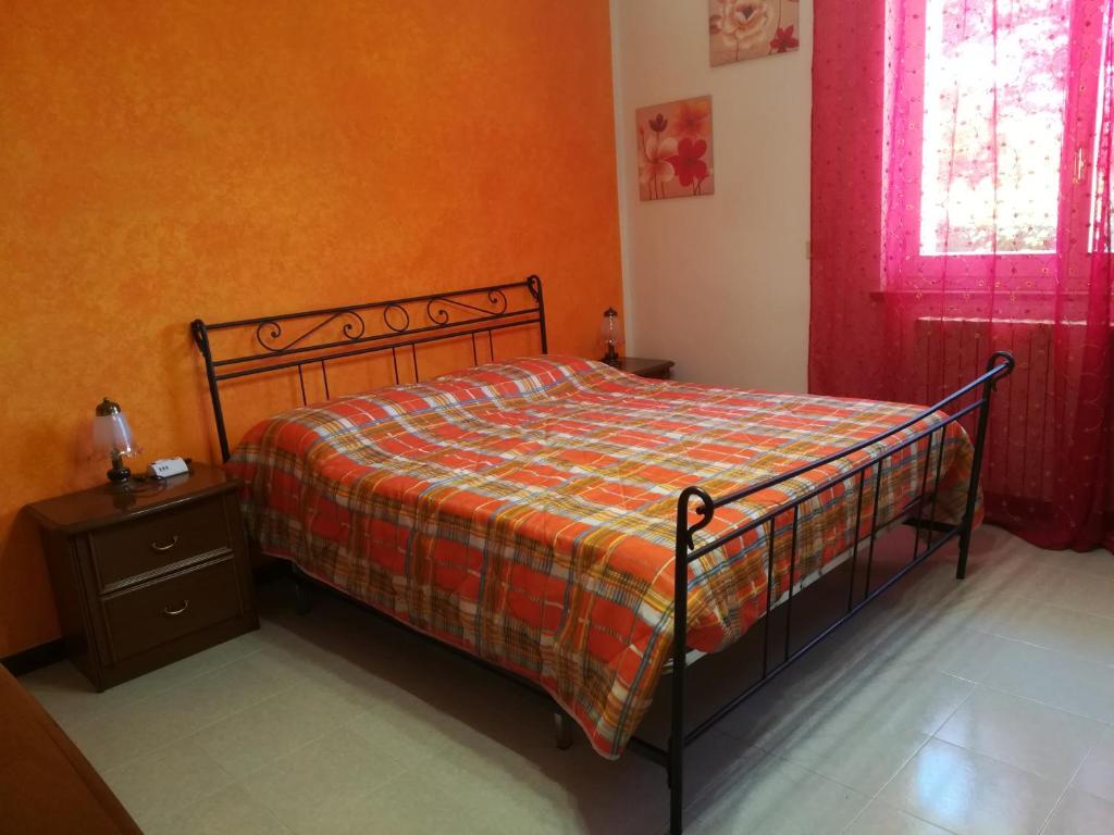 Łóżko lub łóżka w pokoju w obiekcie Angolo Felice B&B