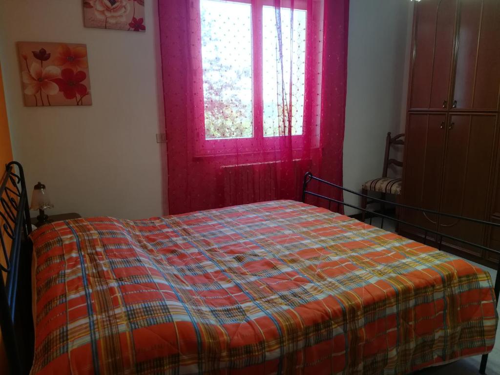 Łóżko lub łóżka w pokoju w obiekcie Angolo Felice B&B