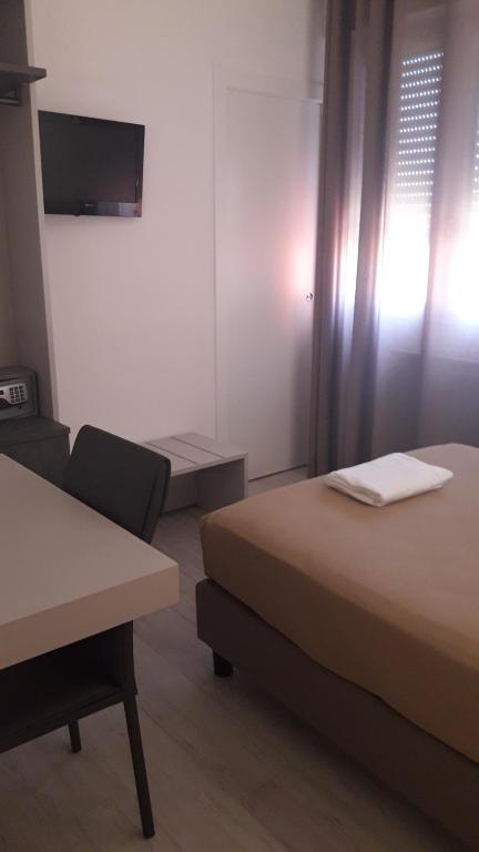 TV a/nebo společenská místnost v ubytování Hotel Cinzia