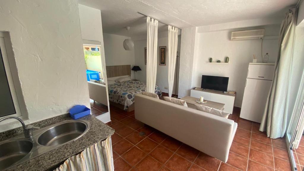 Televízia a/alebo spoločenská miestnosť v ubytovaní GABISOL Apartments 2
