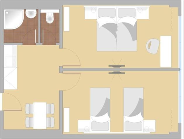a floor plan of a house with furniture at Hotel Energie in Prague
